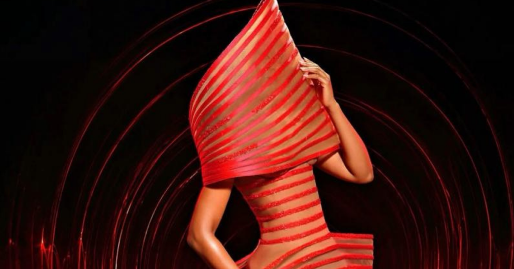 Osas Ighodaro stuns in futuristic red Veekee James couture look ahead of AMVCA 2026.