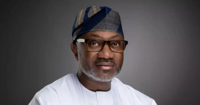 Femi Otedola at a corporate event following his increased investment in First HoldCo shares.