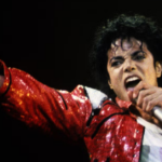 Michael Jackson’s iconic red and black Thriller jacket and rhinestone studded glove featured in a historic memorabilia auction.